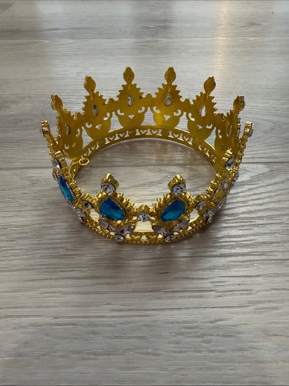 Gold Decorative Jeweled Crown with Blue Gems
